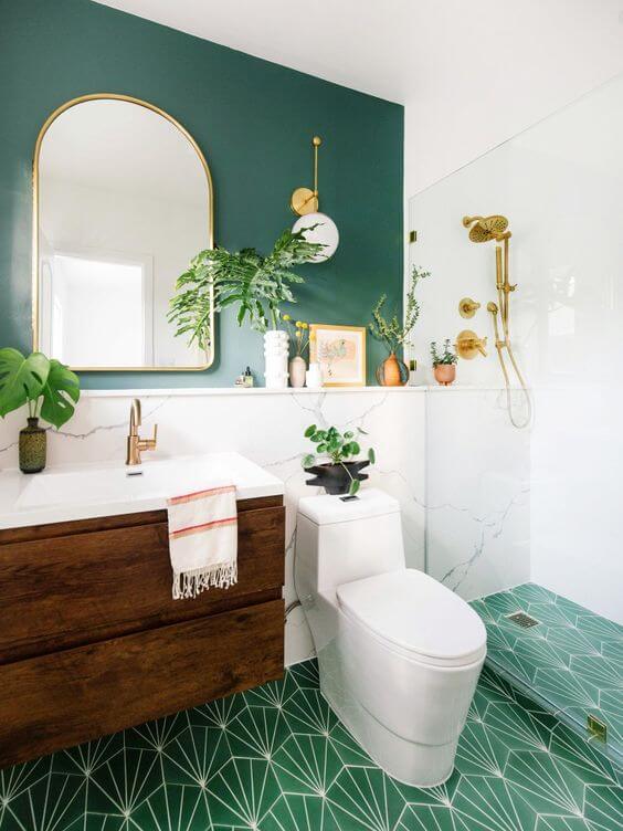 Banheiro retrô com parede e piso verde