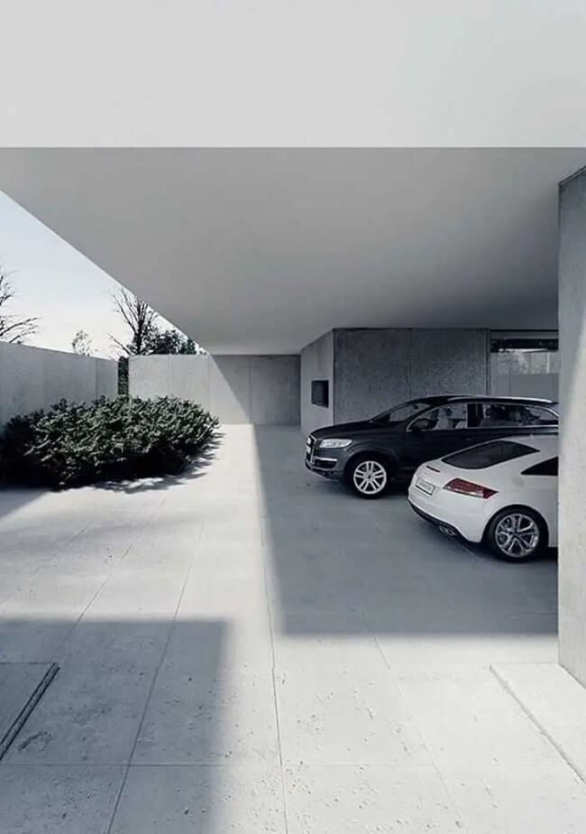 Casa com garagem na lateral e jardim de plantas. Fonte: Ideias Decor
