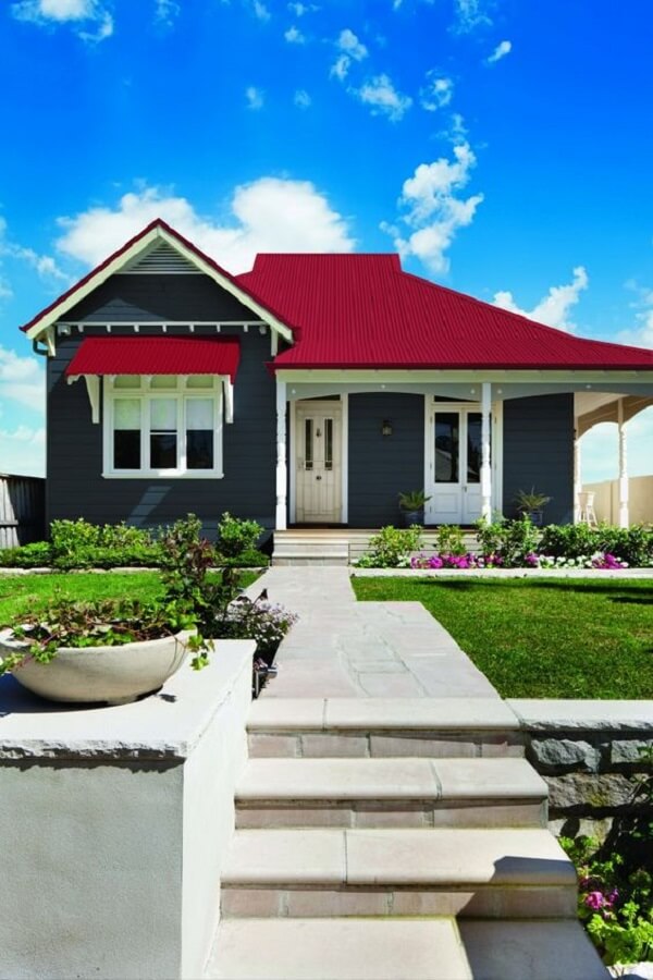 Modelo de casa com telhado vermelho