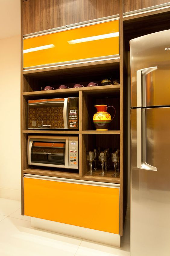 Cozinha modulada amarelo com torre quente